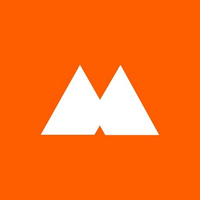 White geometric “M” shape resembling two triangles on an orange square background. Maxim Creative Group is a Plasloc client.