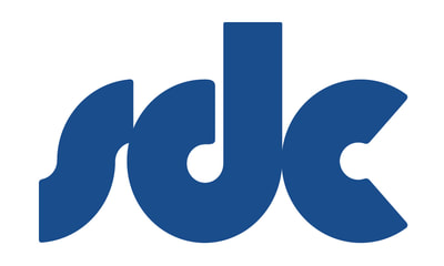 Blue “sdc” logo in a bold, rounded font on a white background. sdc is a Plasloc client.