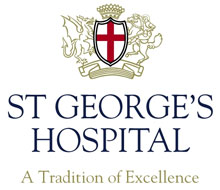 St George’s Hospital logo with a crest featuring a red cross, a crown, and a lion, above the slogan “A Tradition of Excellence.”. St George’s Hospital is a Plasloc client.